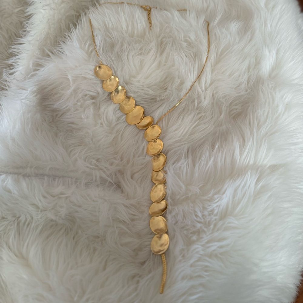 Unique gold plunging necklace
